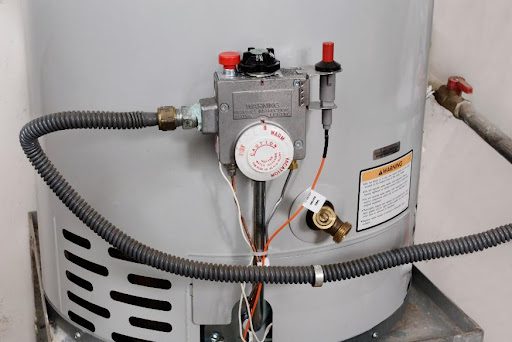 A close up image of a residential water heater that has been professionally serviced by a certified plumber in Olivette, MO.