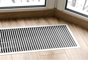 A floor vent inside a home in St. Louis, MO. It is not blocked by furniture because when it is unobstructed, it can efficiently heat the home.