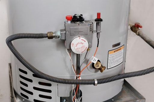 A residential water heater in Manchester, MO leaking and needs expert water heater repair services from an HVAC technician.