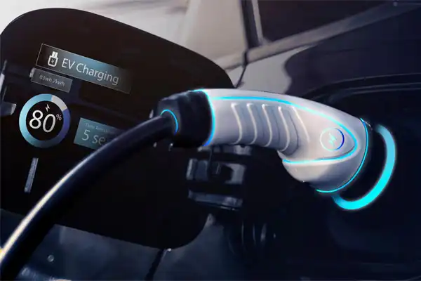 The electric vehicle charging station, expertly installed for optimum efficiency, features a visible display showing 80% charge.